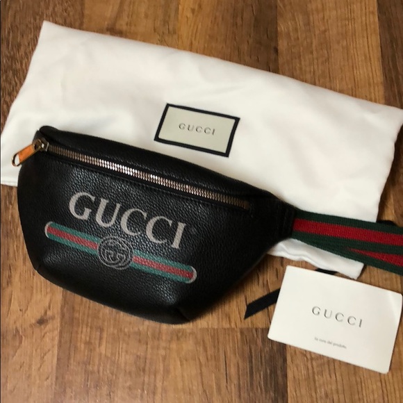 Gucci Handbags - Gucci print belt bag in black. Sz 90